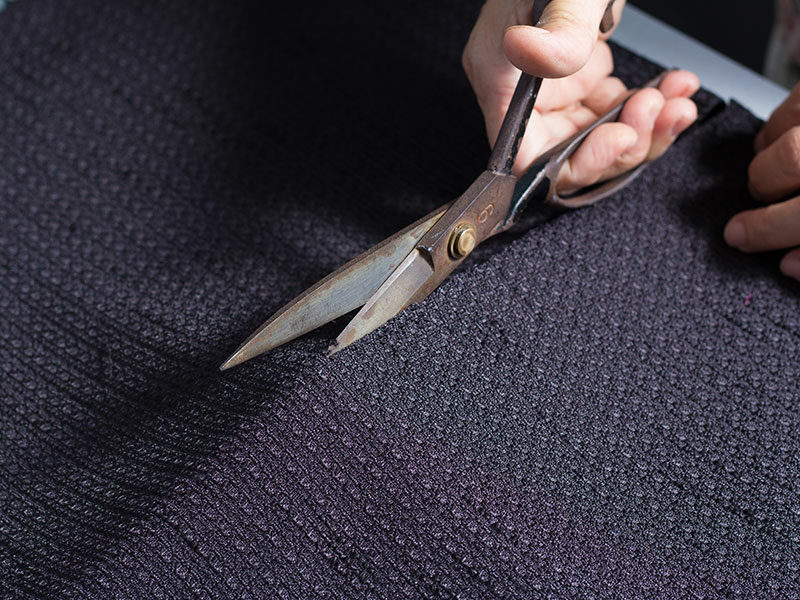 Scissors Cutting Fabric