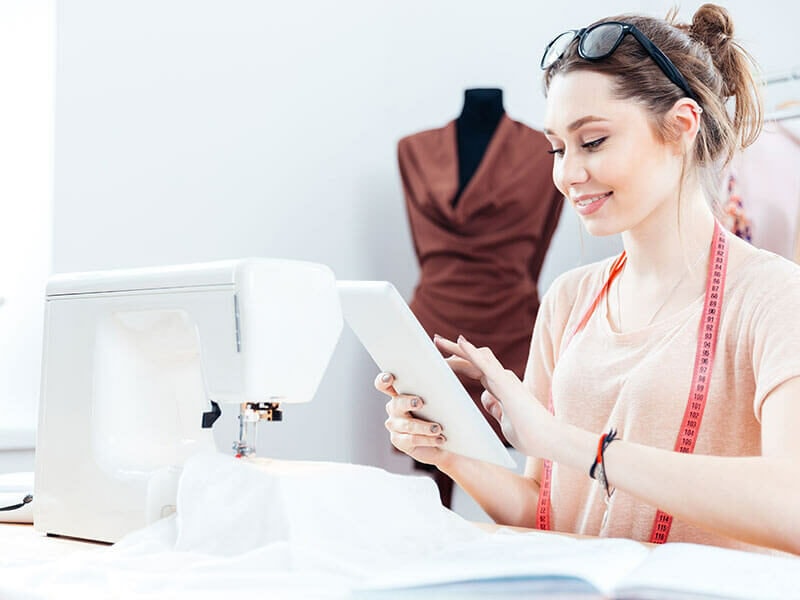 Woman Check Information Sewing Machine