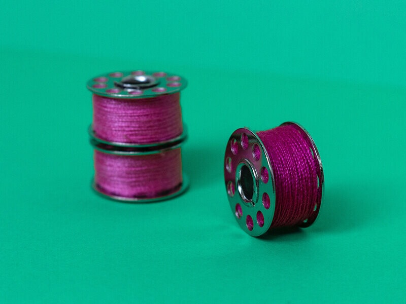 Metal Bobbins with Thread